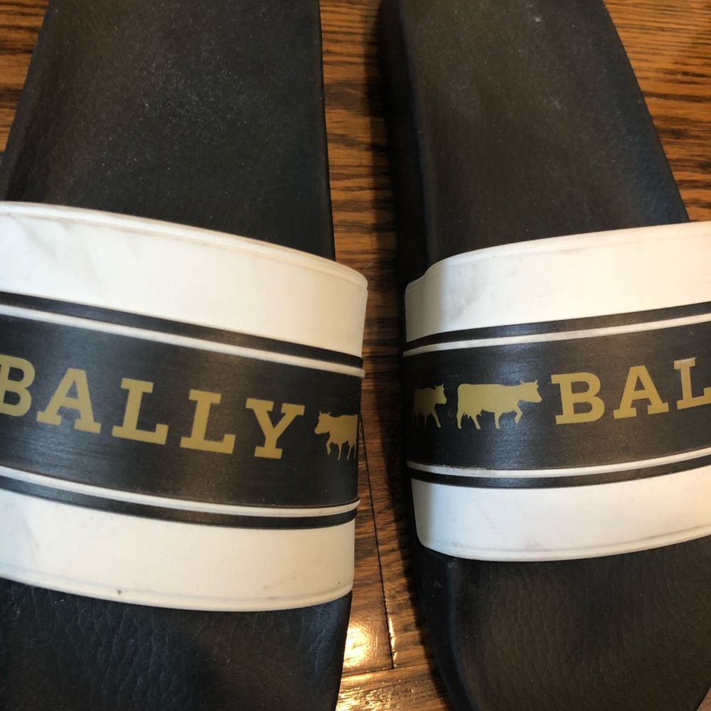 Worn once indoors. Bally slides size 11. Price negotiable!